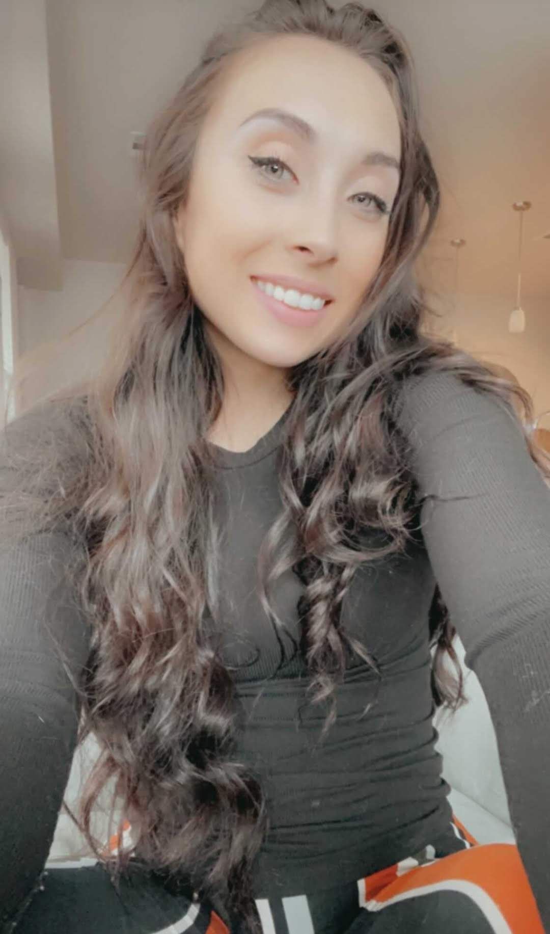 brunette woman before her photoshoot