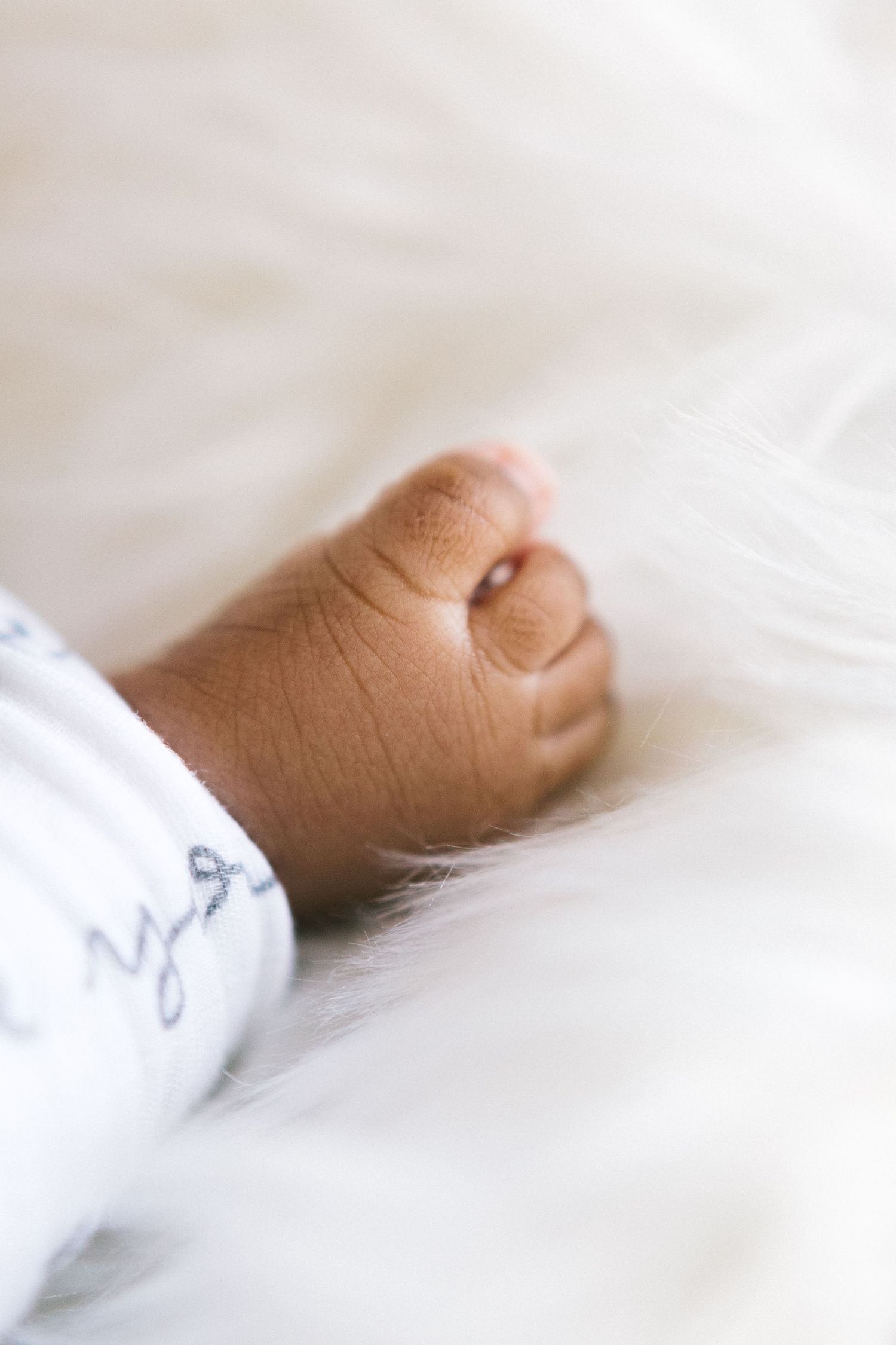 Baby portrait during newborn session in NYC, photo by Paula Brearley NYC newborn photographer