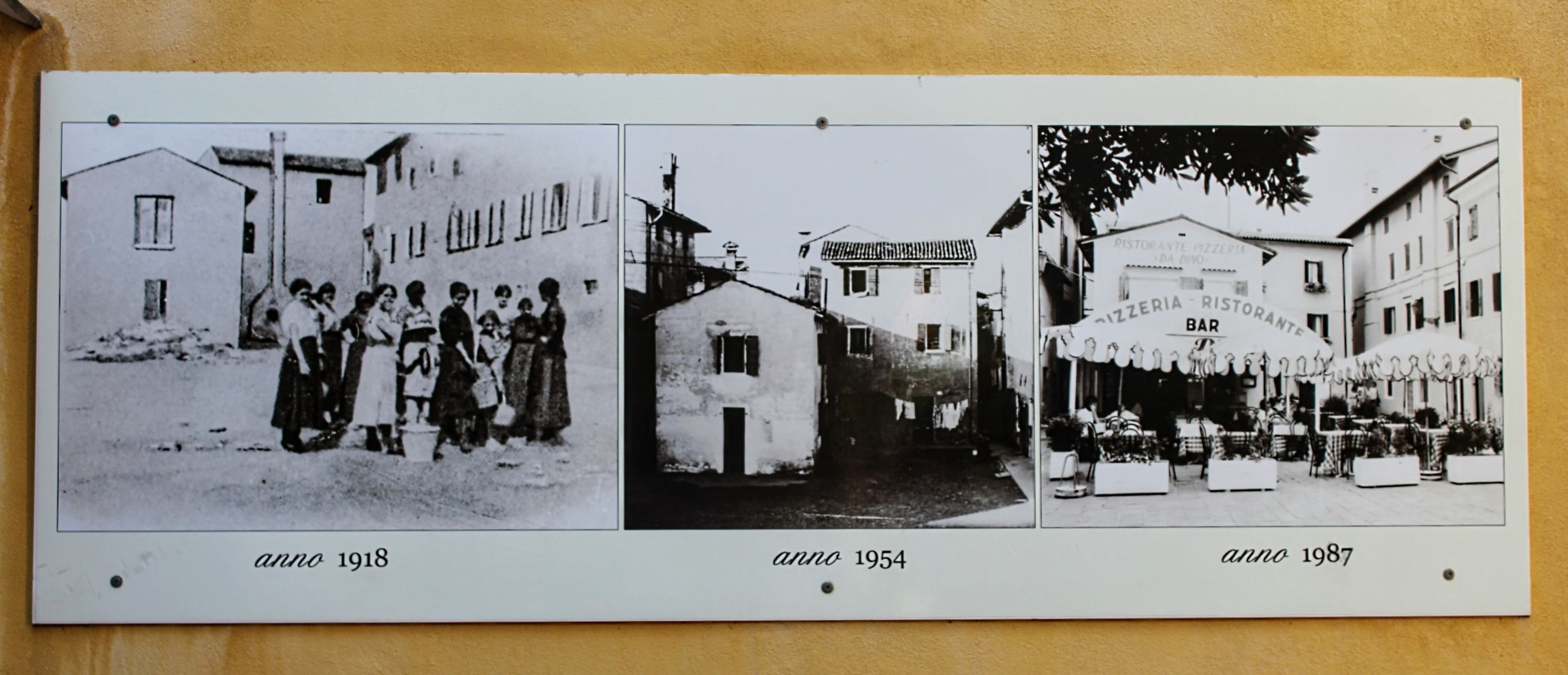 The history of the building in the photos on the wall.