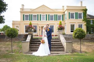 Bride and groom outside the lawn in Rochford on their wedding day