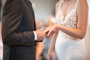 couple exchanging wedding rings
