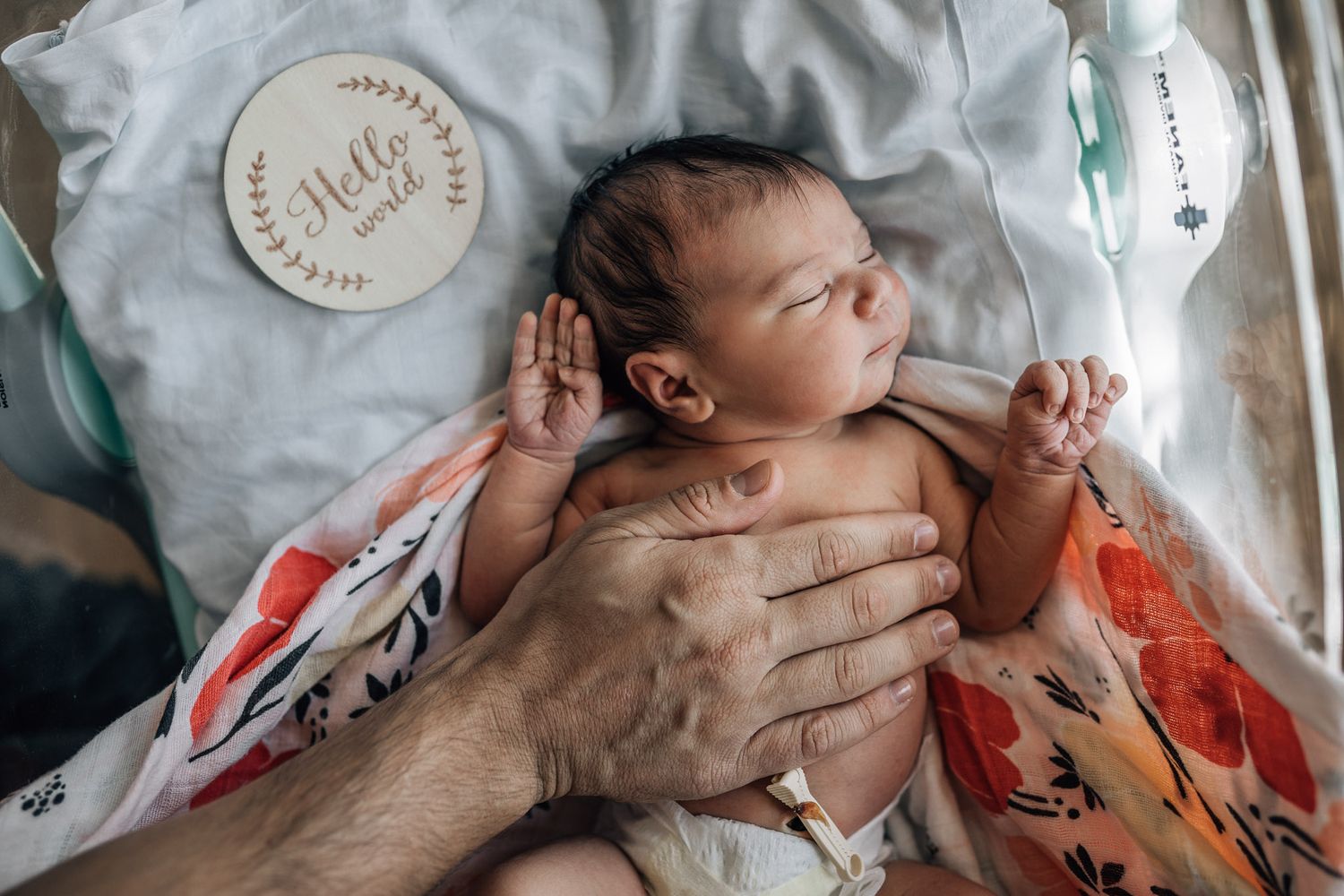newborn baby in a bassinet during fresh 48 photo shoot in Dubai