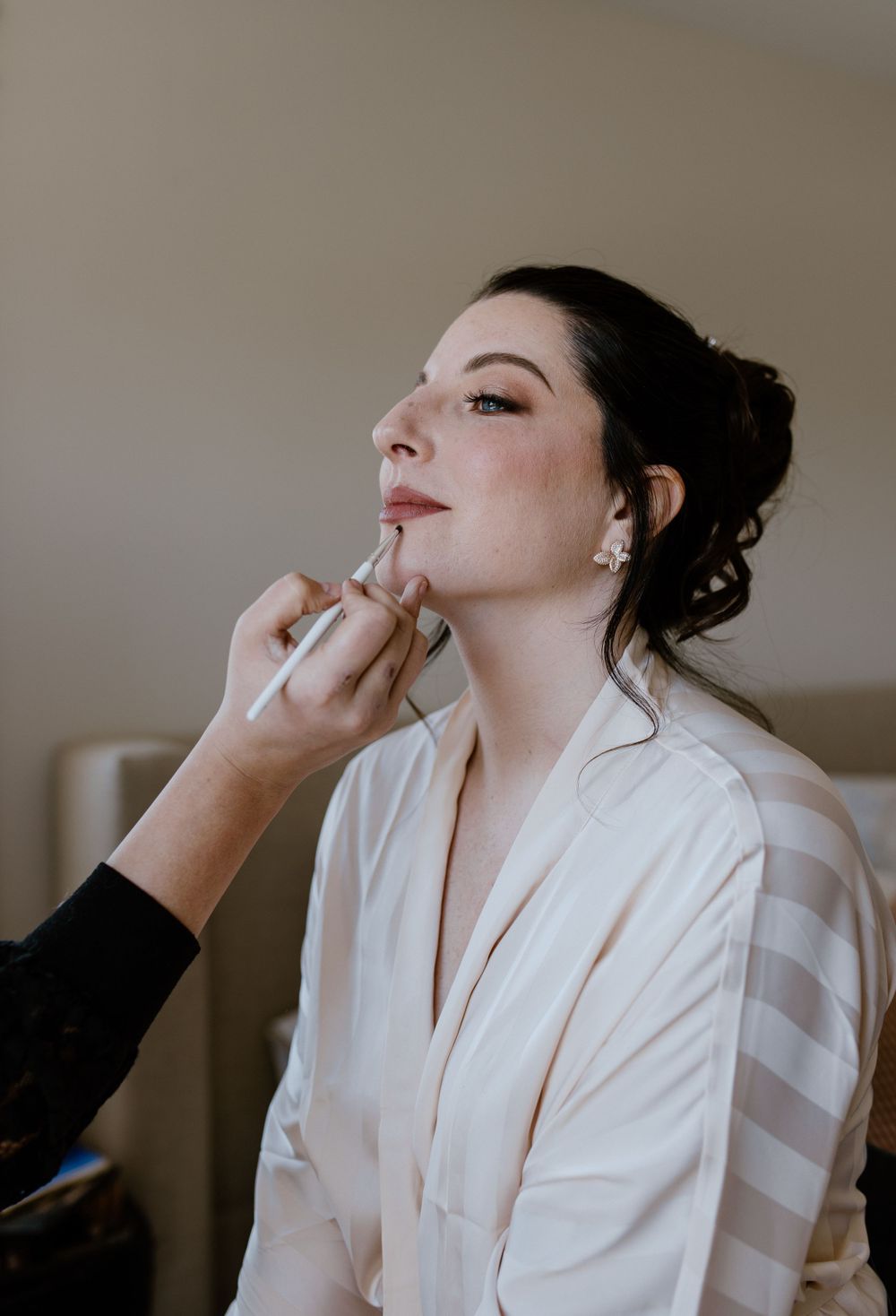 MUA Janine Gerrits doing makeup for bride, Amber-Lyne, in Halifax, Nova Scotia