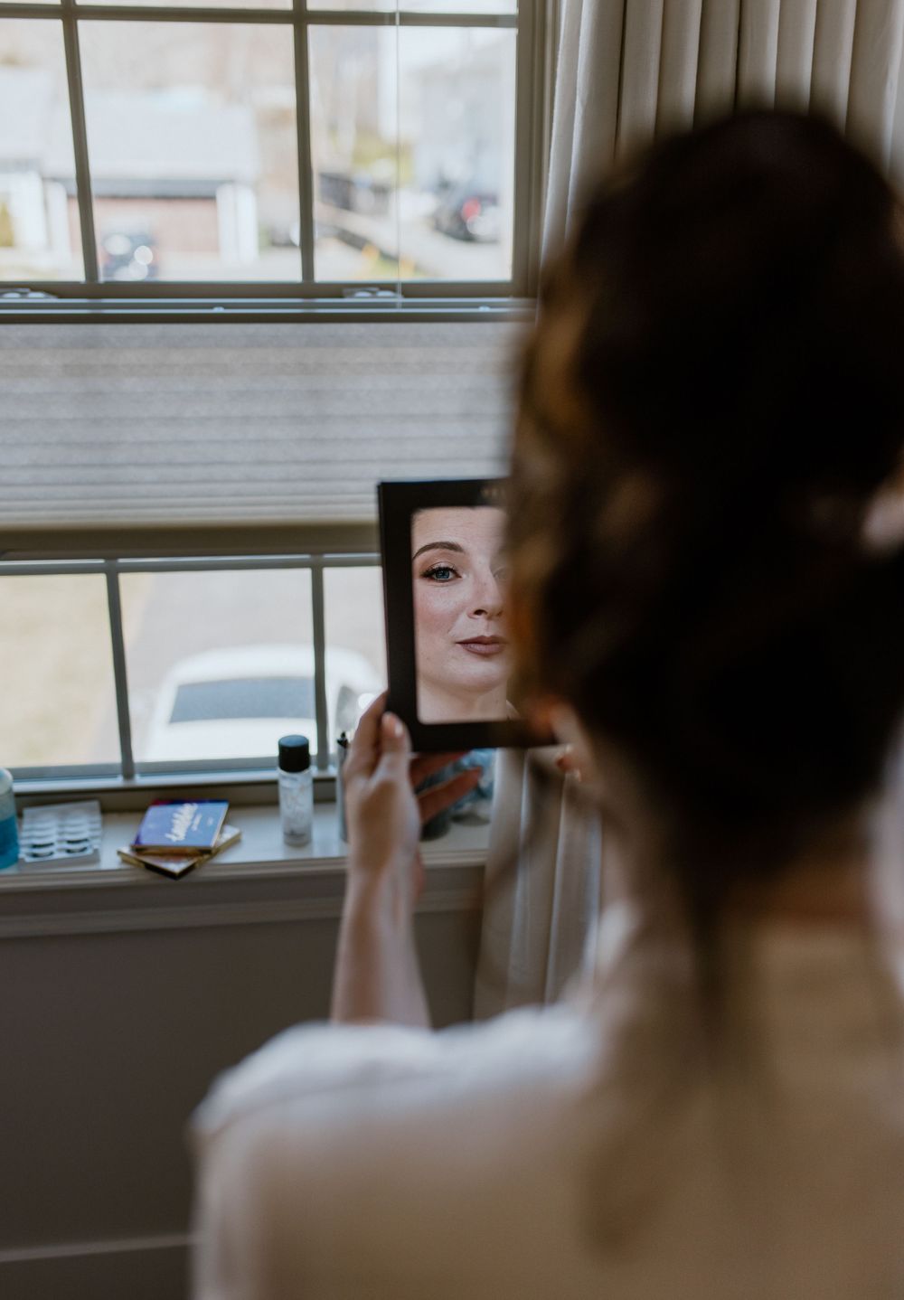 MUA Janine Gerrits doing makeup for bride, Amber-Lyne, in Halifax, Nova Scotia