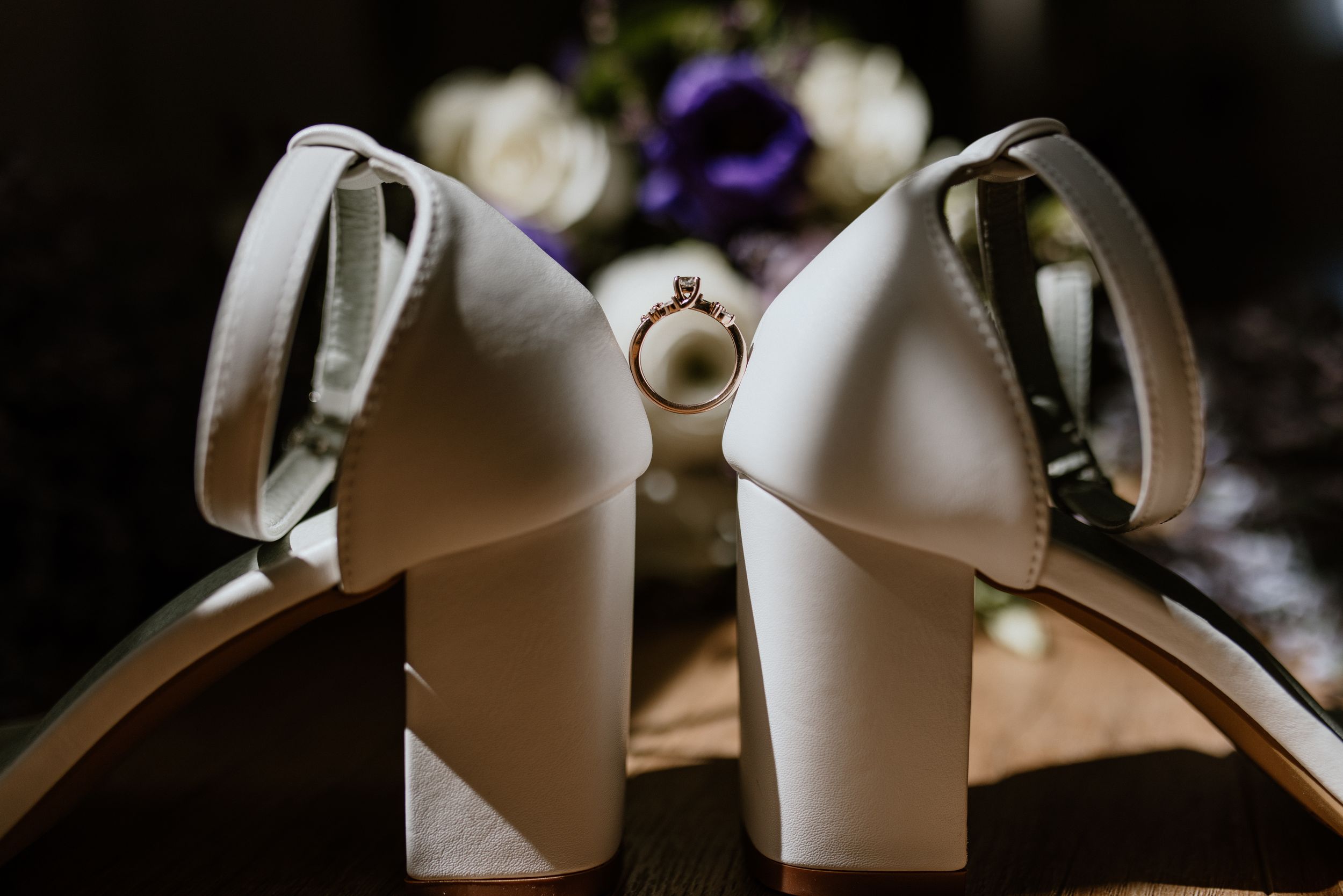 Bridal shoes holding up bride's engagement ring in detail shot, Halifax Nova Scotia