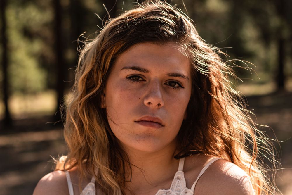 A young model for a "15" photoshoot inspired by Taylor Swift.