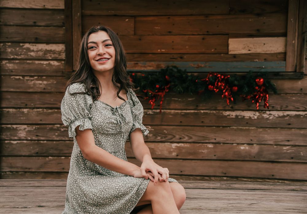 teen girl in green dress christmas