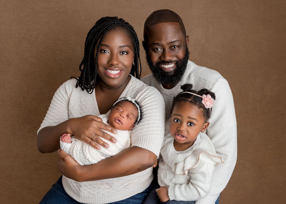 A series of warm brown-toned family portrait photos showing loving embraces and smiles in matching cream-colored outfits.