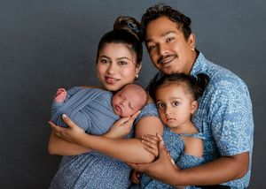 A series of tender family portraits showing warm embraces and loving moments against a dark gray backdrop.