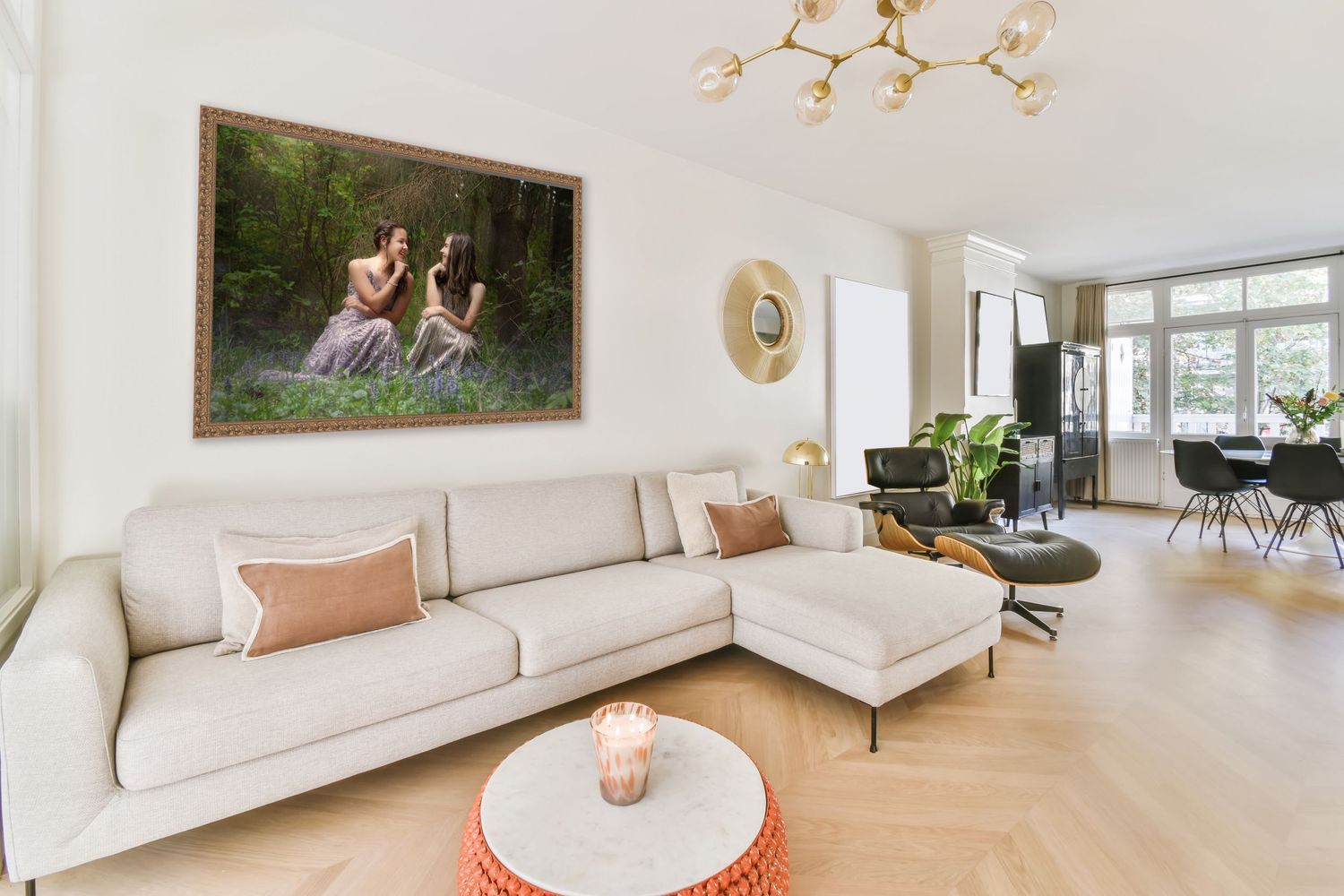 Living room with landscape canvas.