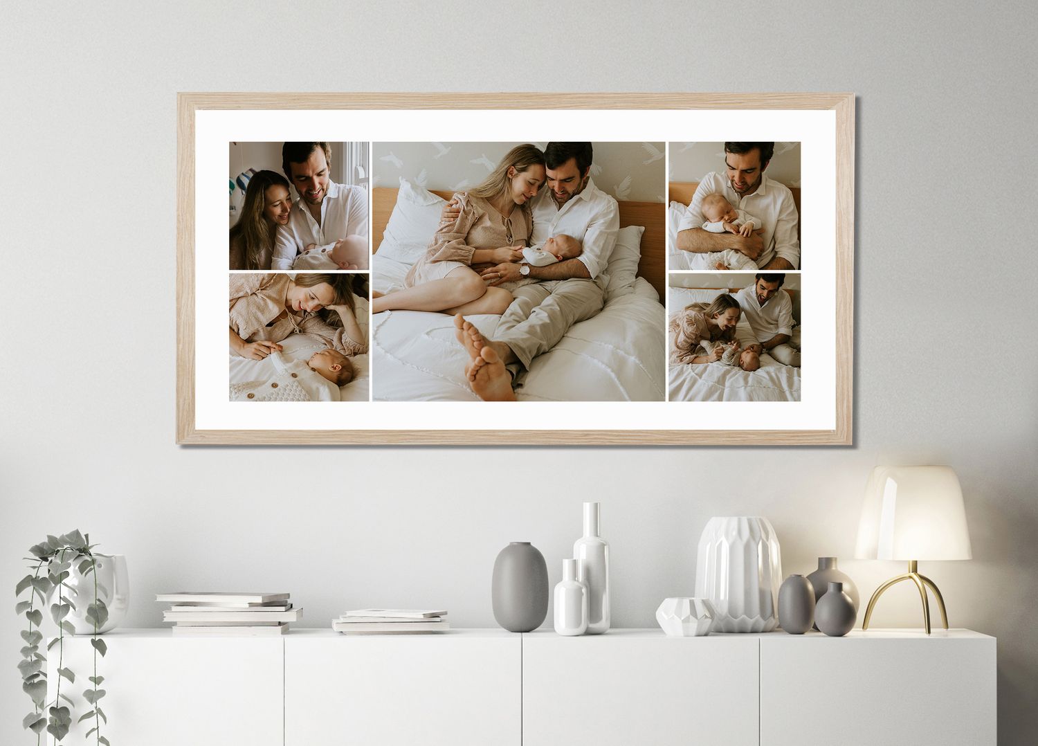 Contemporary interior design featuring framed family photos and minimalist white furniture.