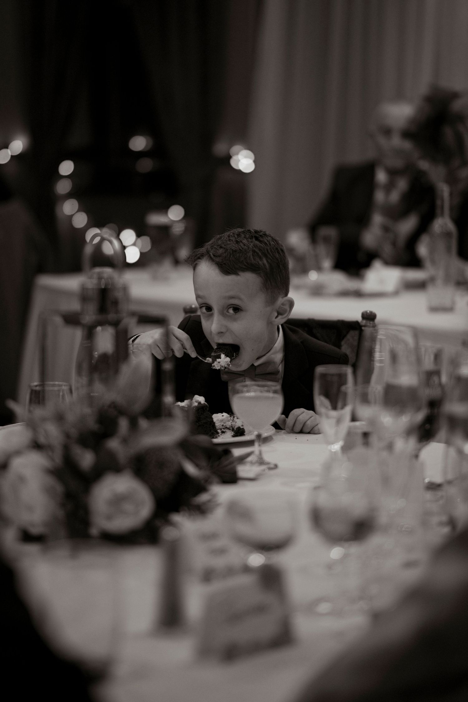page boy eating cake
