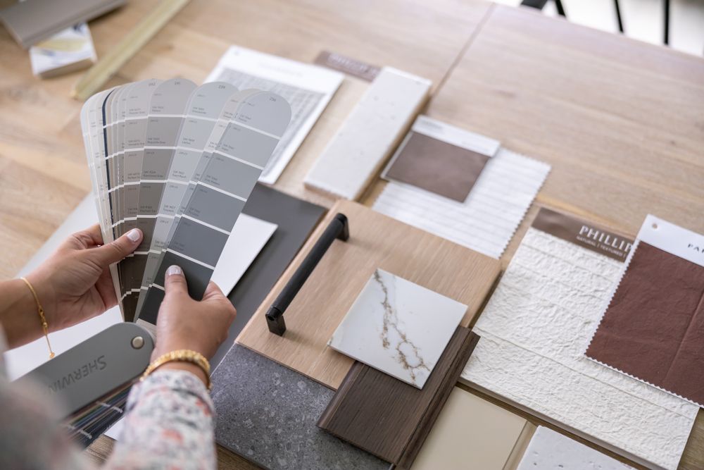 Fairspring Designs an Interior Designer in Maple Valley, WA lifestyle personal branding photos woman selecting paint