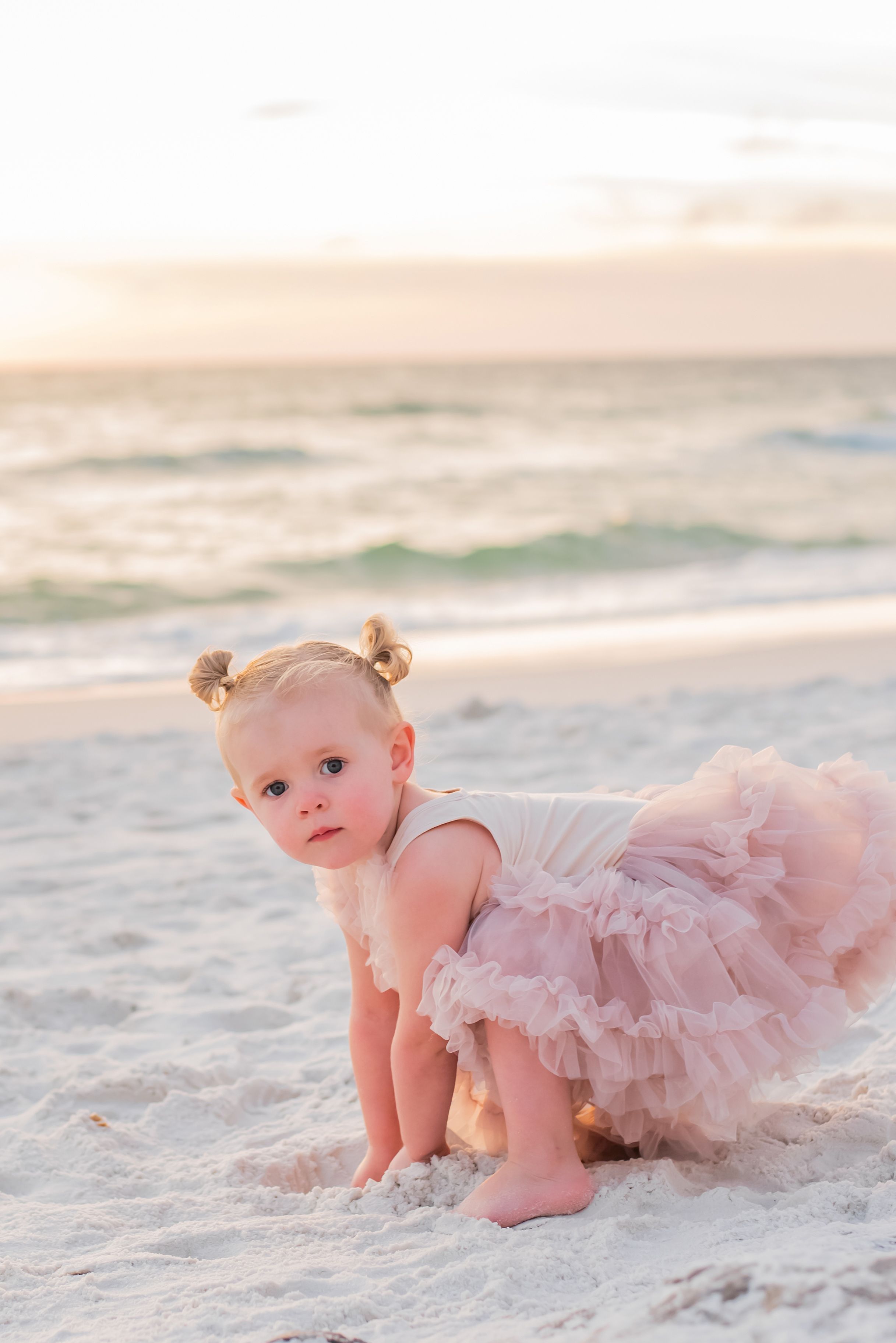baby on Panama City Beach Florida with sunset during fun candid beach photo session