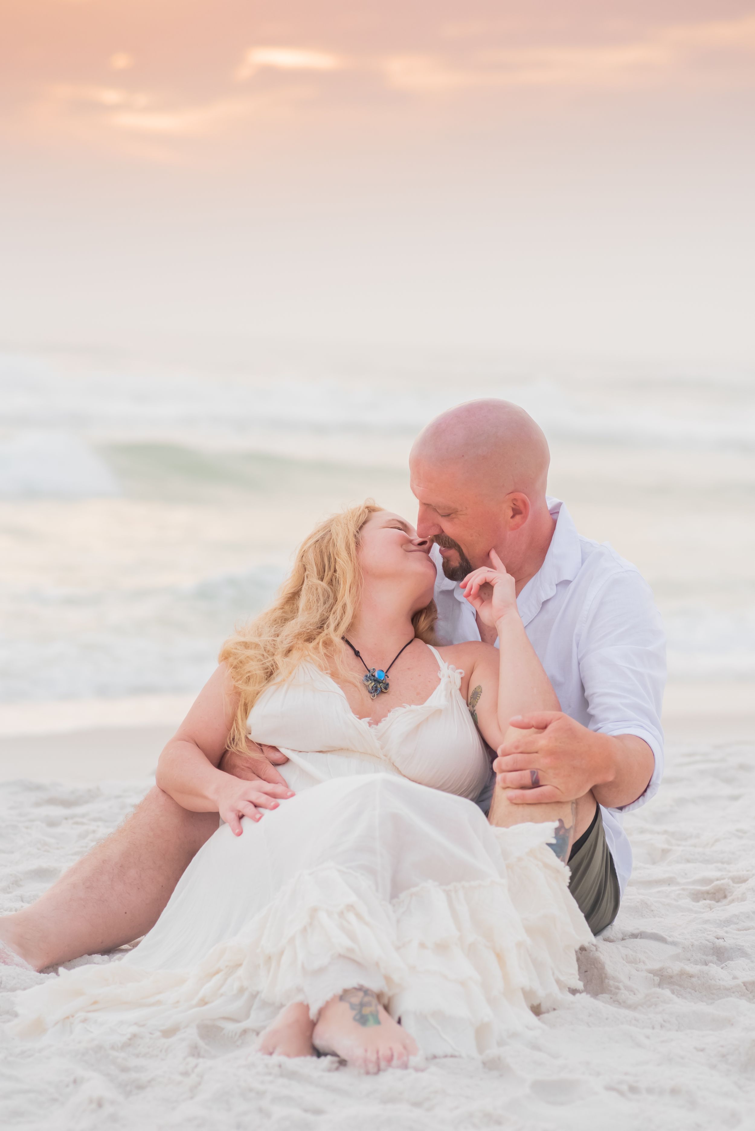 Bride & Groom kissing at sunset on Panama City Beach Florida