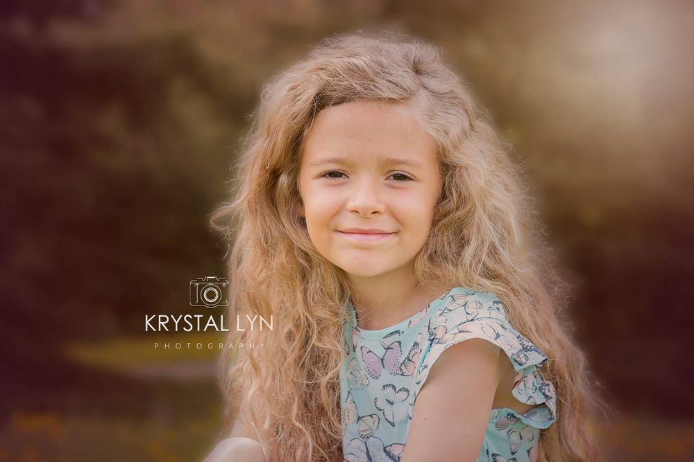 Model call with curly hair sat so still while Halton photographer took her photo