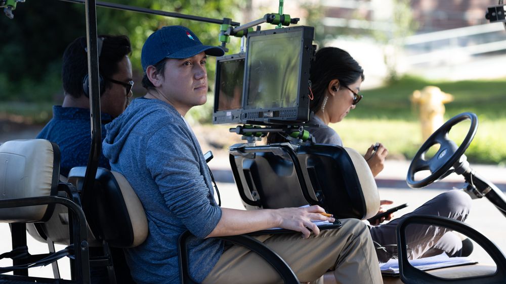 People sitting in vehicles during what appears to be a drive-through event.