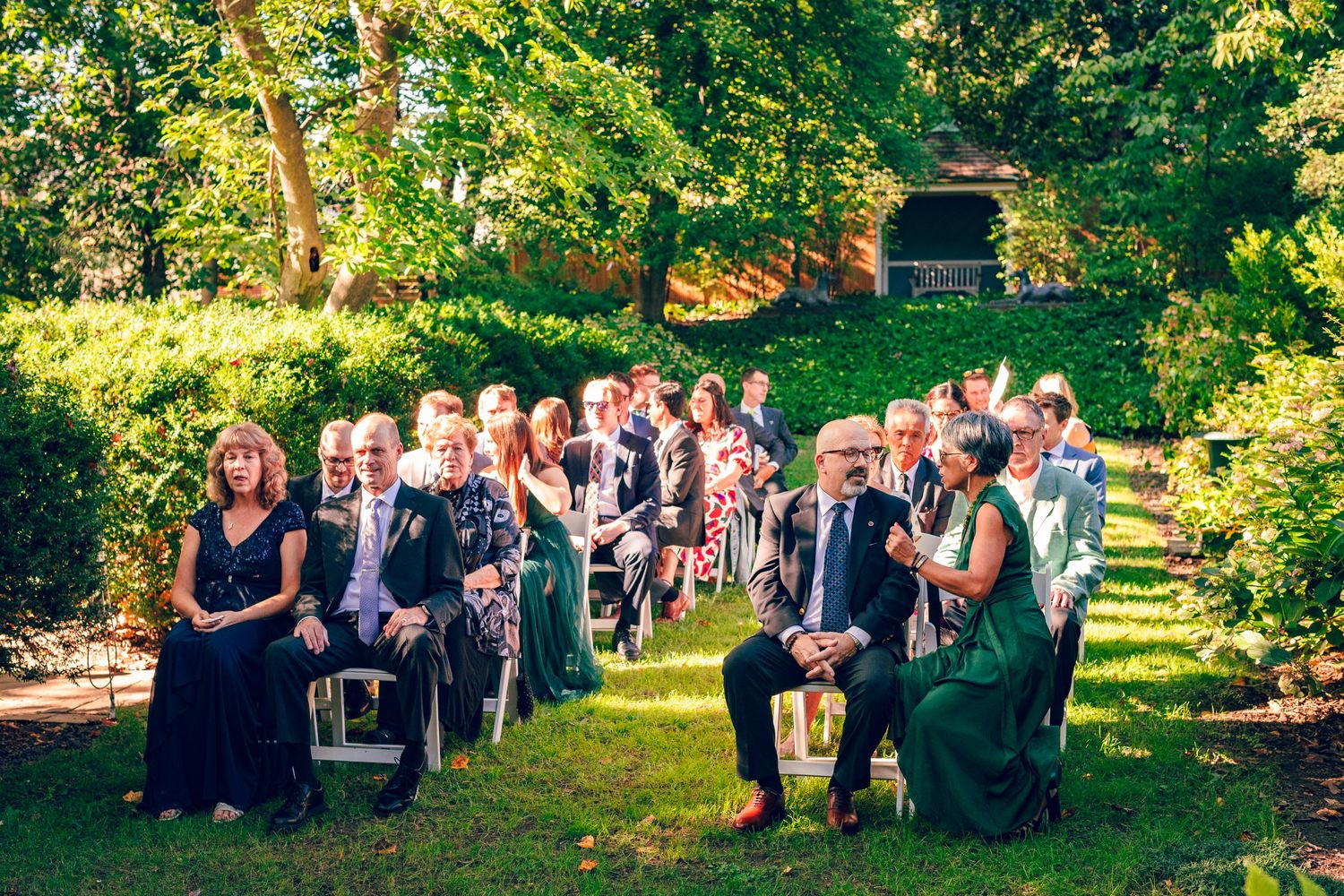 Wedding guests waiting for bride and groom to arrive at Bowling Green