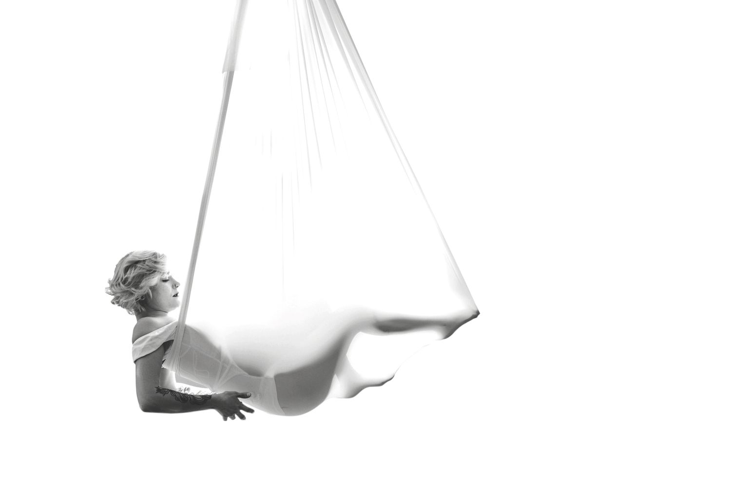 Luxury maternity session in aerial silk in Lawrence KS