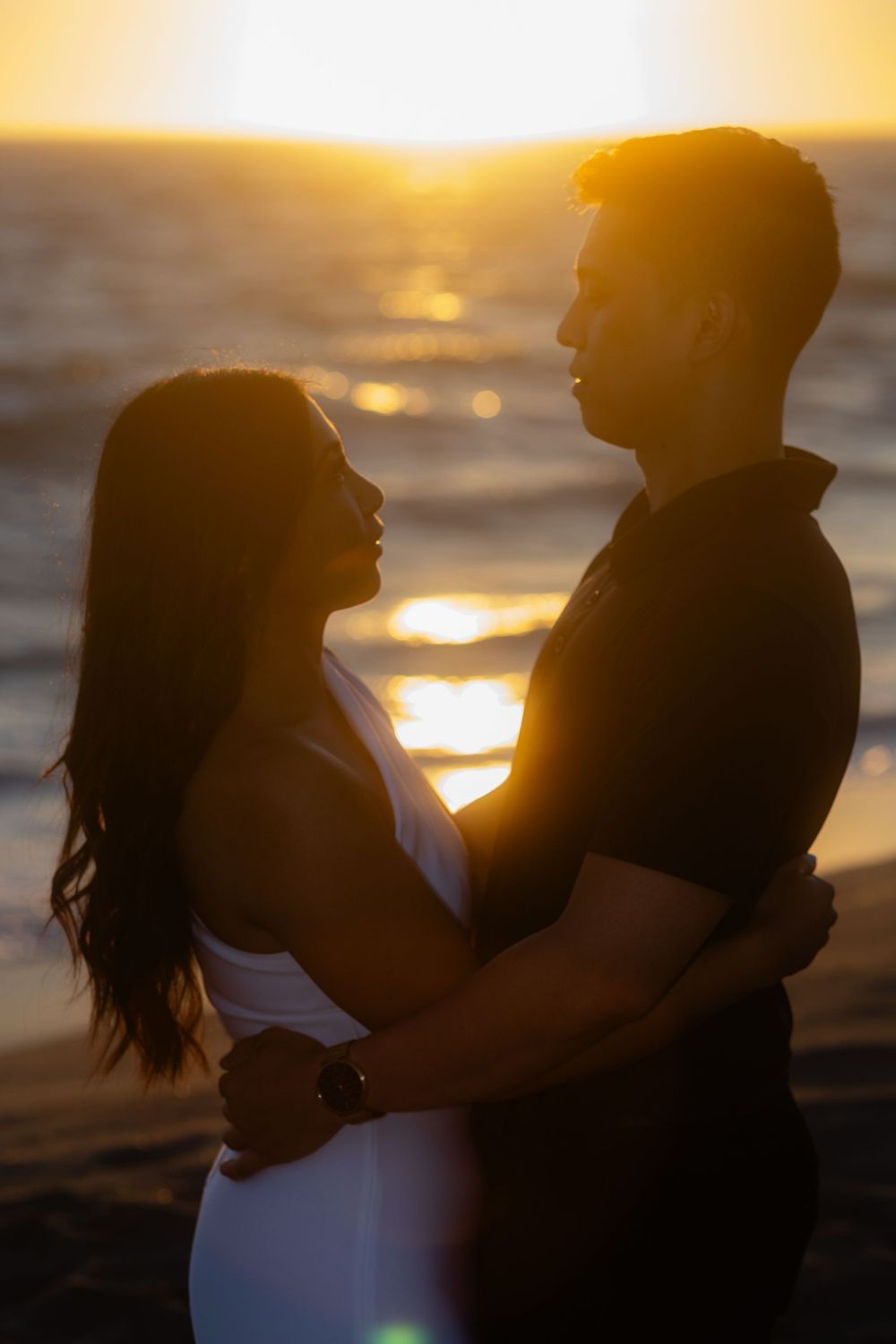 Lovely engagement photoshoot with an adoring couple based in Los Angeles County. Shot at a local beach within the Malibu region. Point Dume.