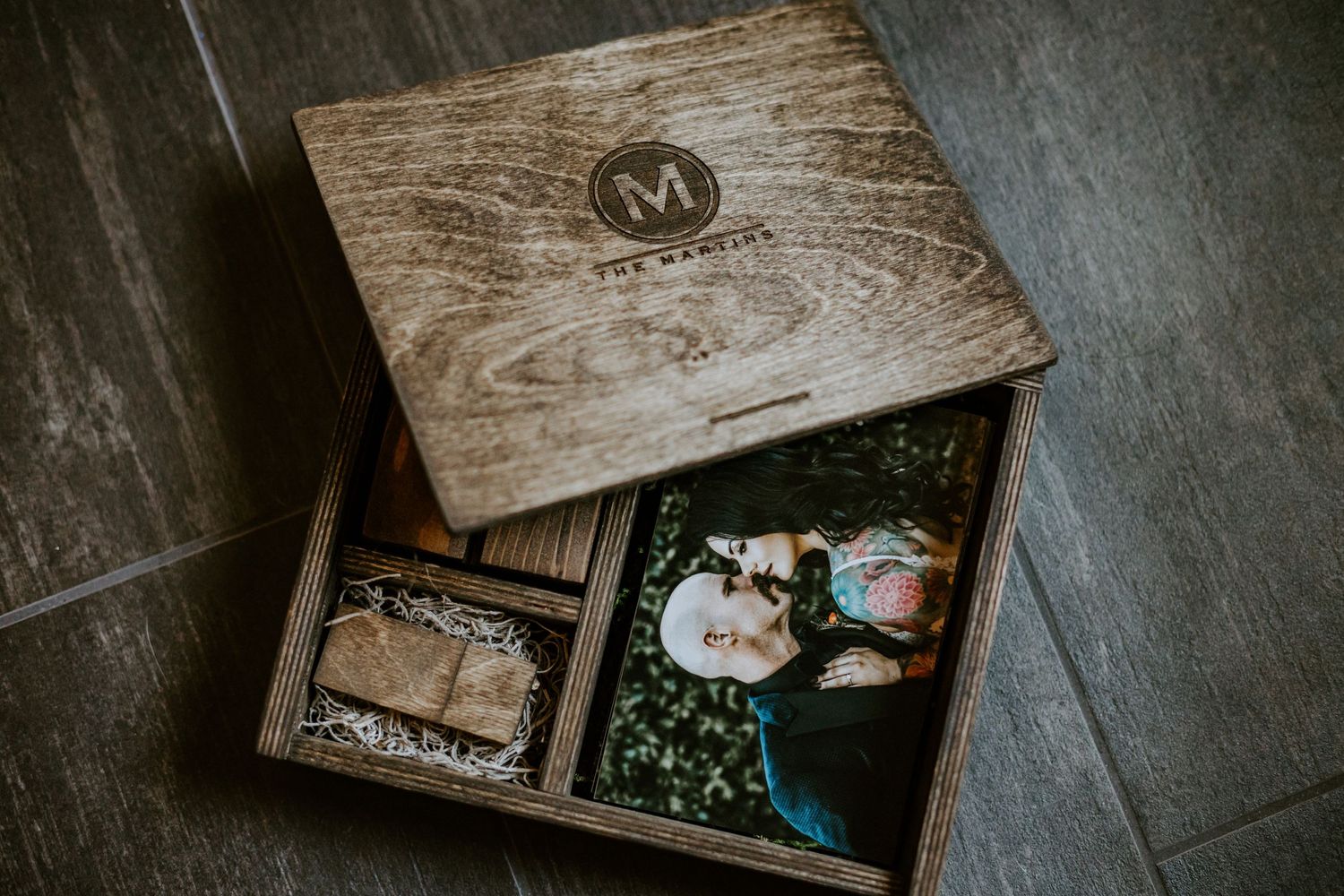 Wooden keepsake box with monogram containing wedding photographs. Samantha Sky Photography.