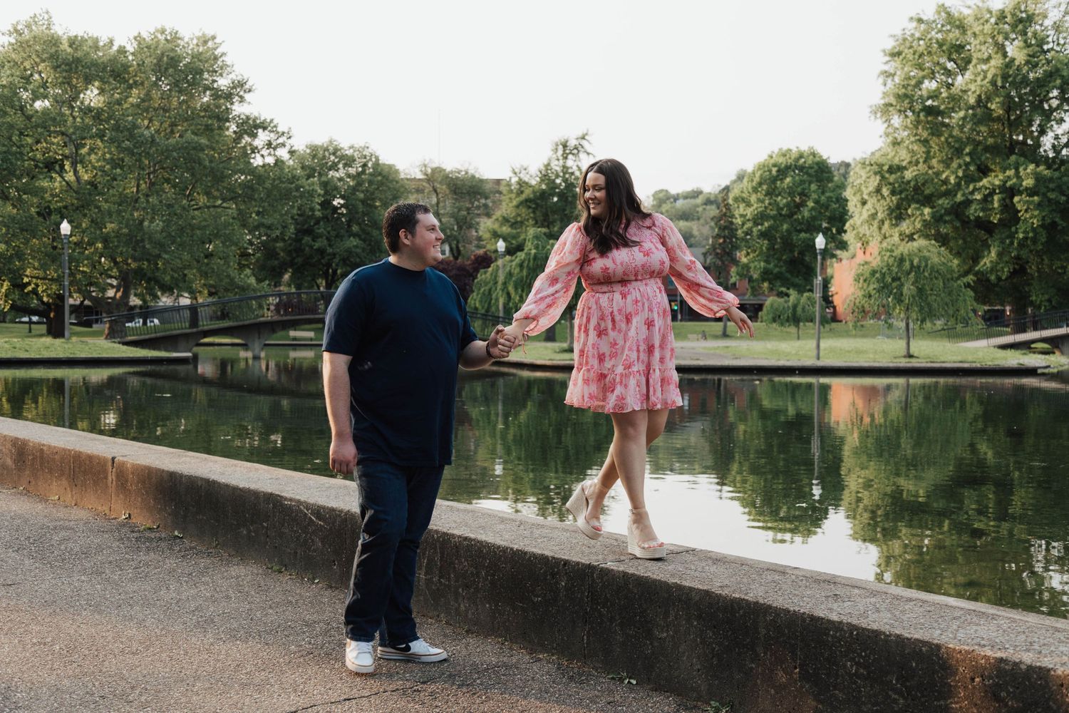 Engaged couple having a stroll in a park in Pittsburgh