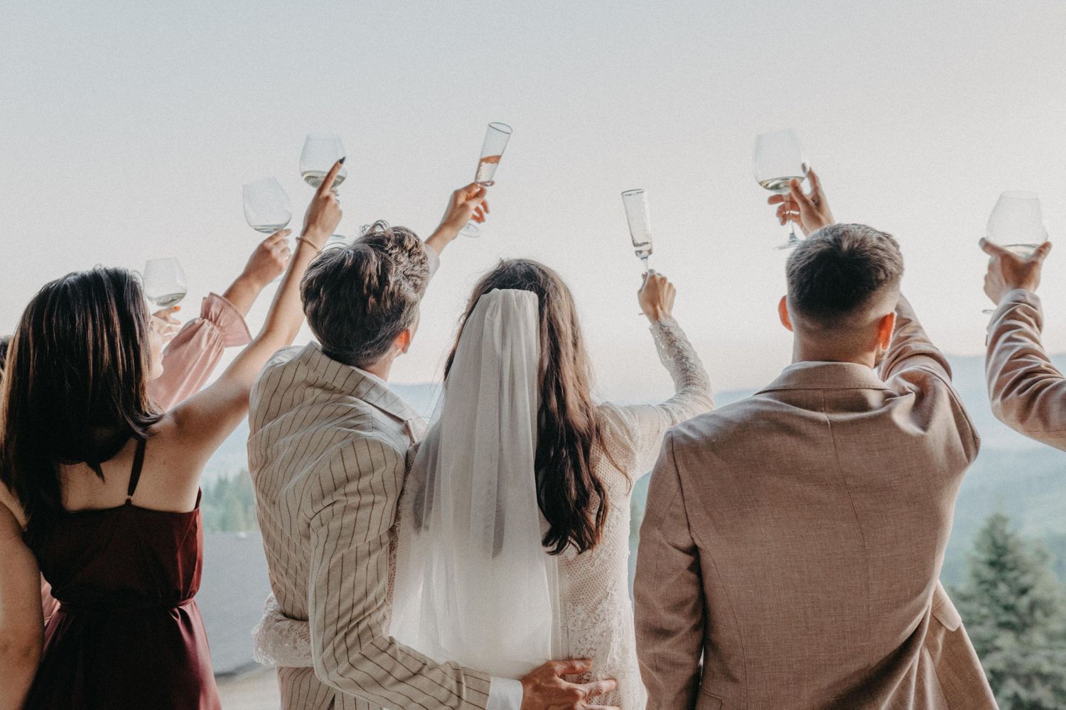 small wedding celebration wedding party photo cheering
