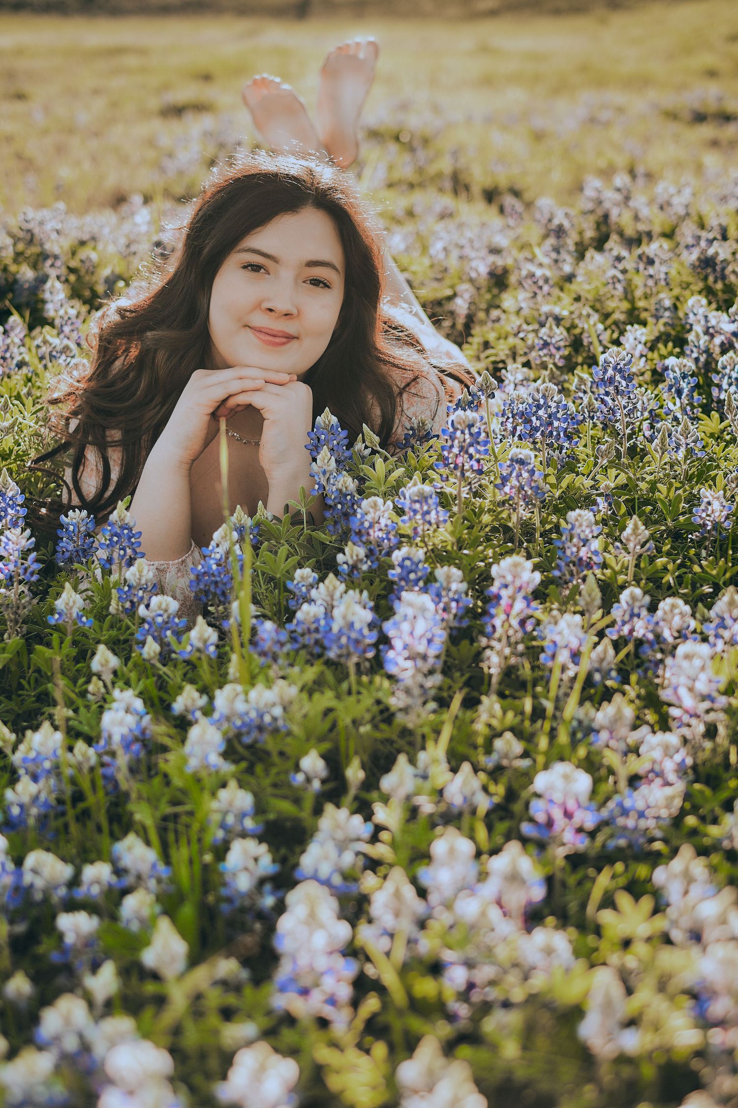 Woman posing for bluebonnet portrait session - San Marcos, TX