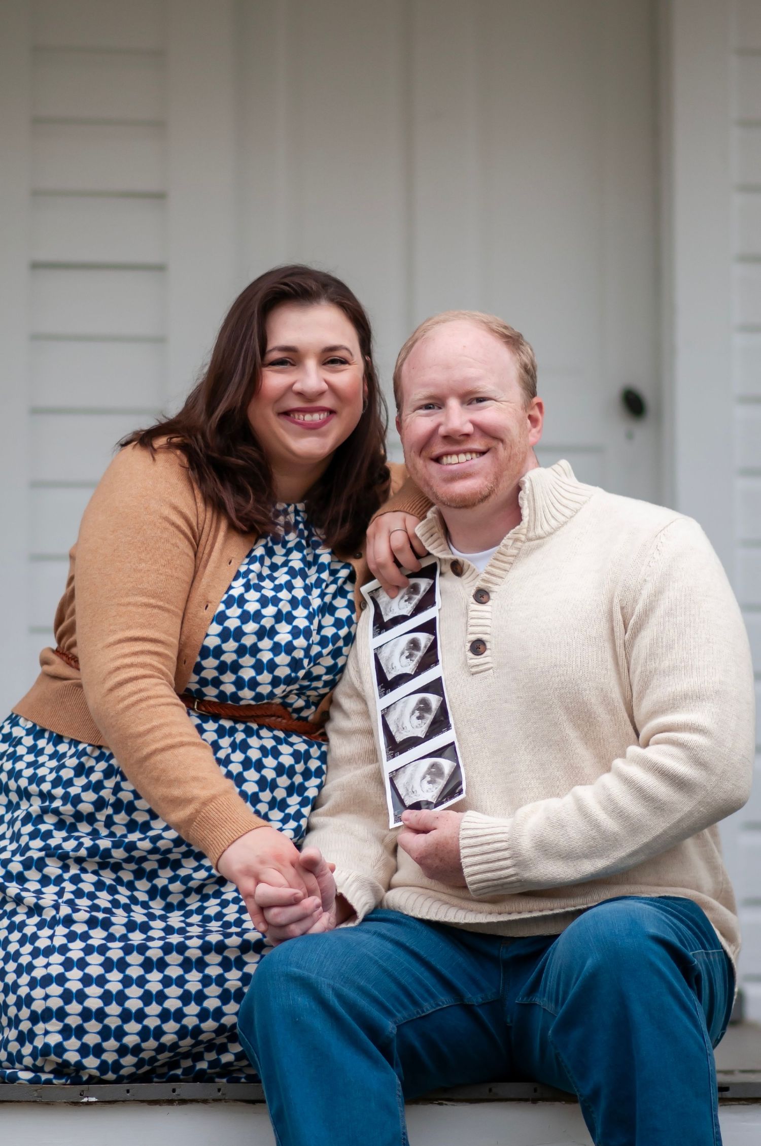 Pregancy announcement sonogram photo mom and dad