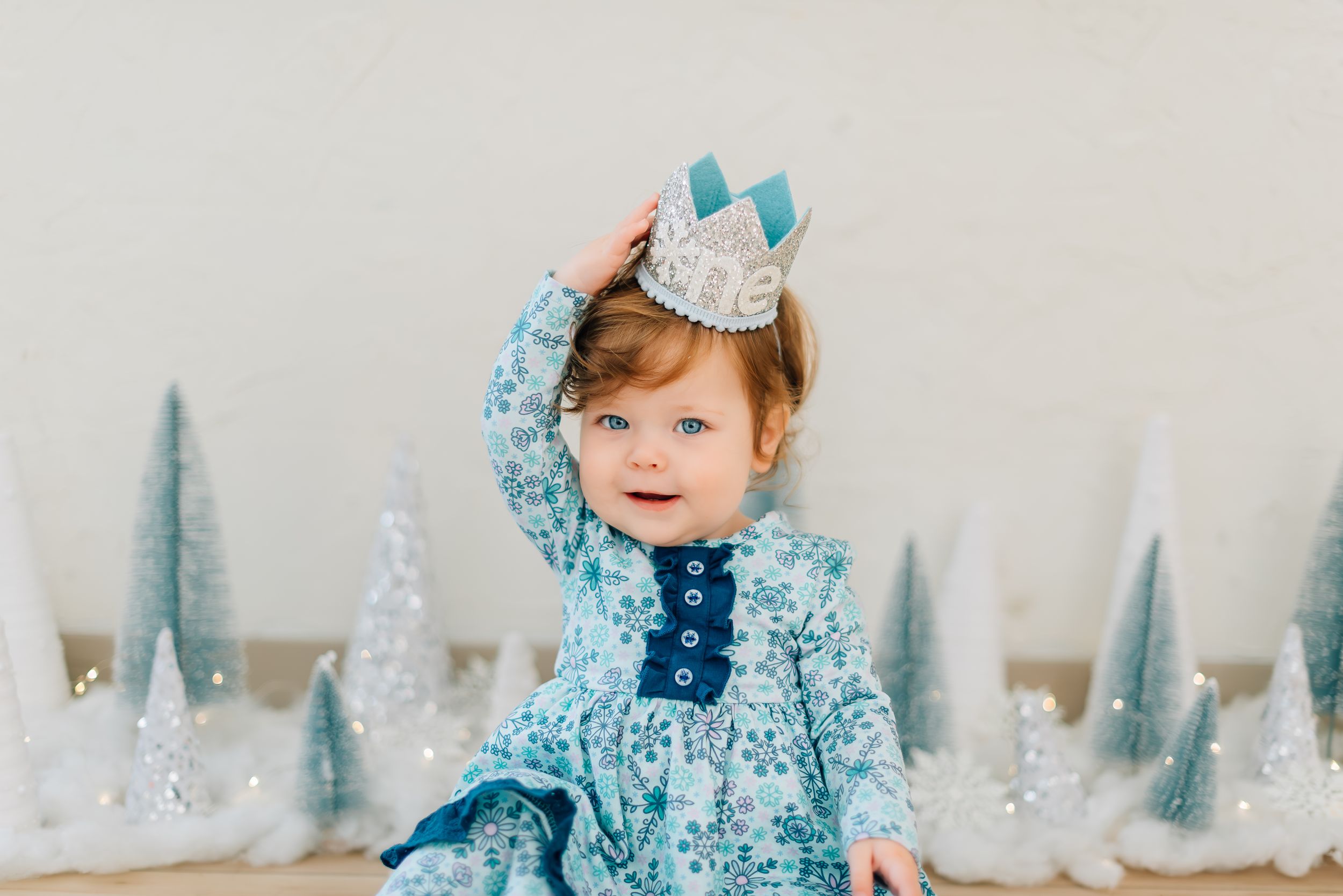 Winter wonderland themed set with blue decorations and miniature trees.