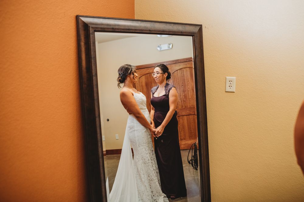 A series of mirror reflections showing wedding dress preparations in an indoor setting.