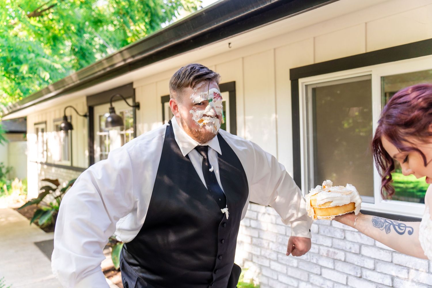 cake in the groom's face