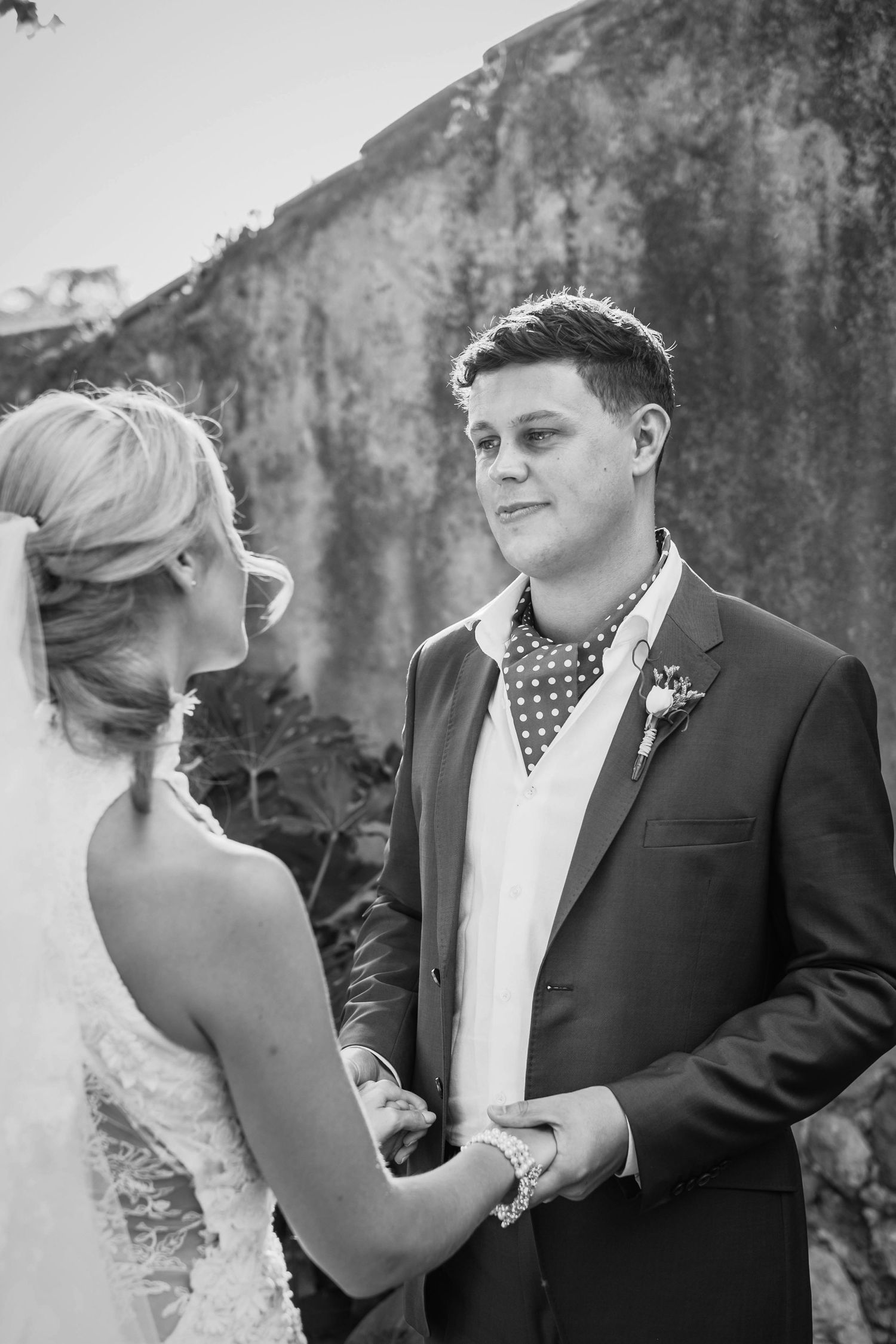 The bride and groom say their vows on their wedding day at Casa Felix, Olivella, Barcelona.