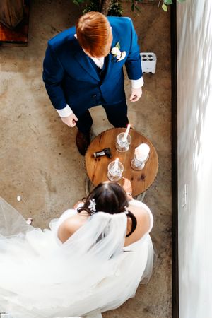 Series of candid moments showing a flowing white wedding dress during the reception.Middle TN wedding photographer
