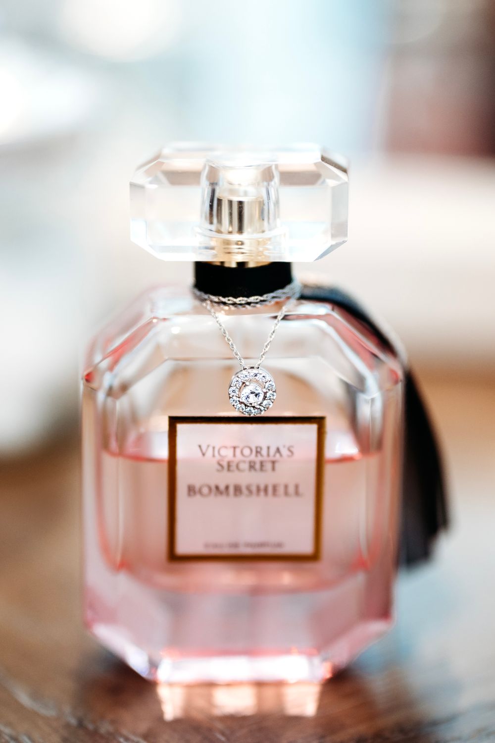 Victoria's Secret Bombshell perfume bottle photographed with soft focus.Middle TN wedding photographer