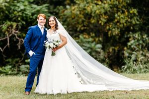 Outdoor wedding photography session in a lush green garden setting. Middle TN wedding photographer
