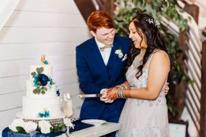 Wedding reception table settings with elegant decor and white floral arrangements.Middle TN wedding photographer