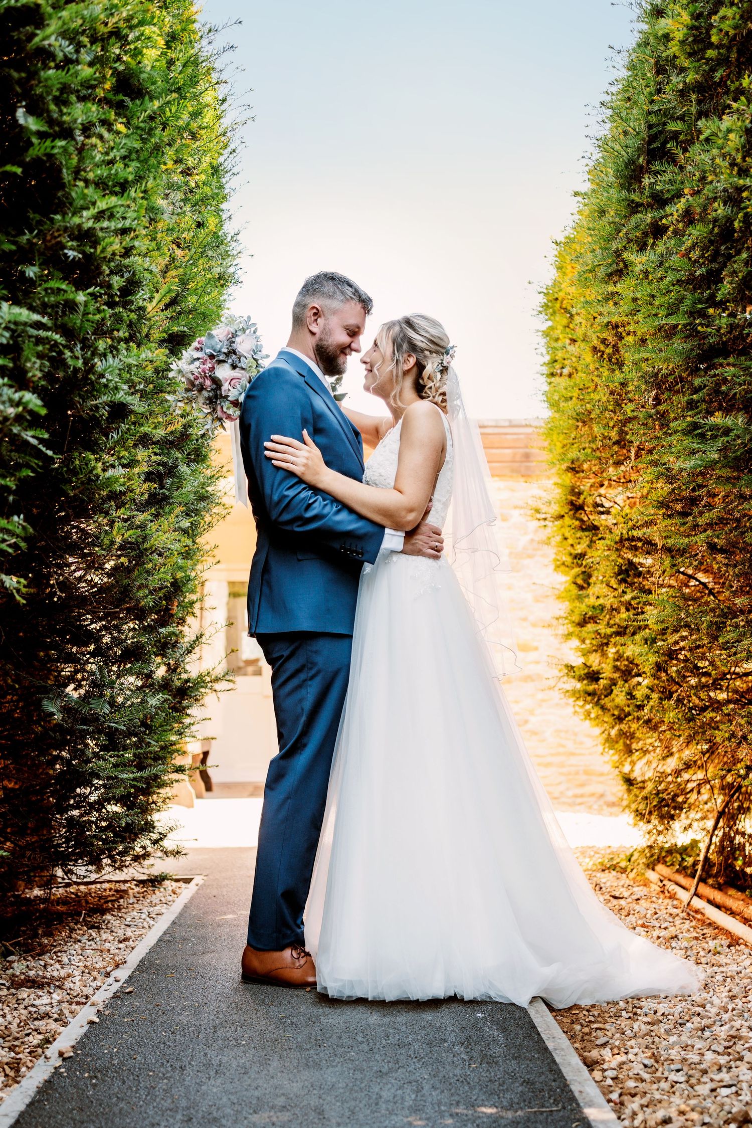 Bride and groom looking lovingly into each others eyes