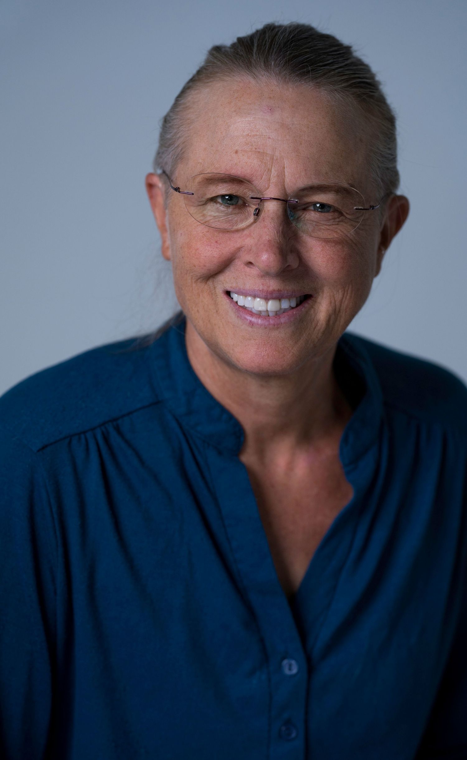 Older lady with navy blue t shirt Headshot at the Blendz Media Video Production Actors Workshop