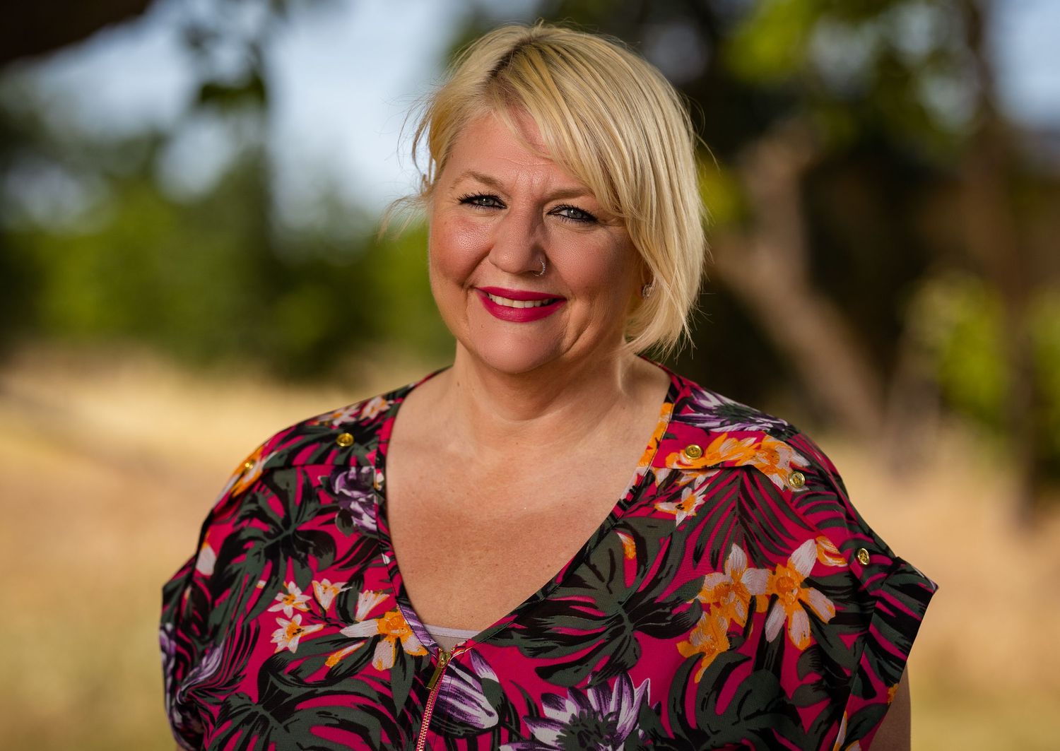Headshot of a woman outdoors