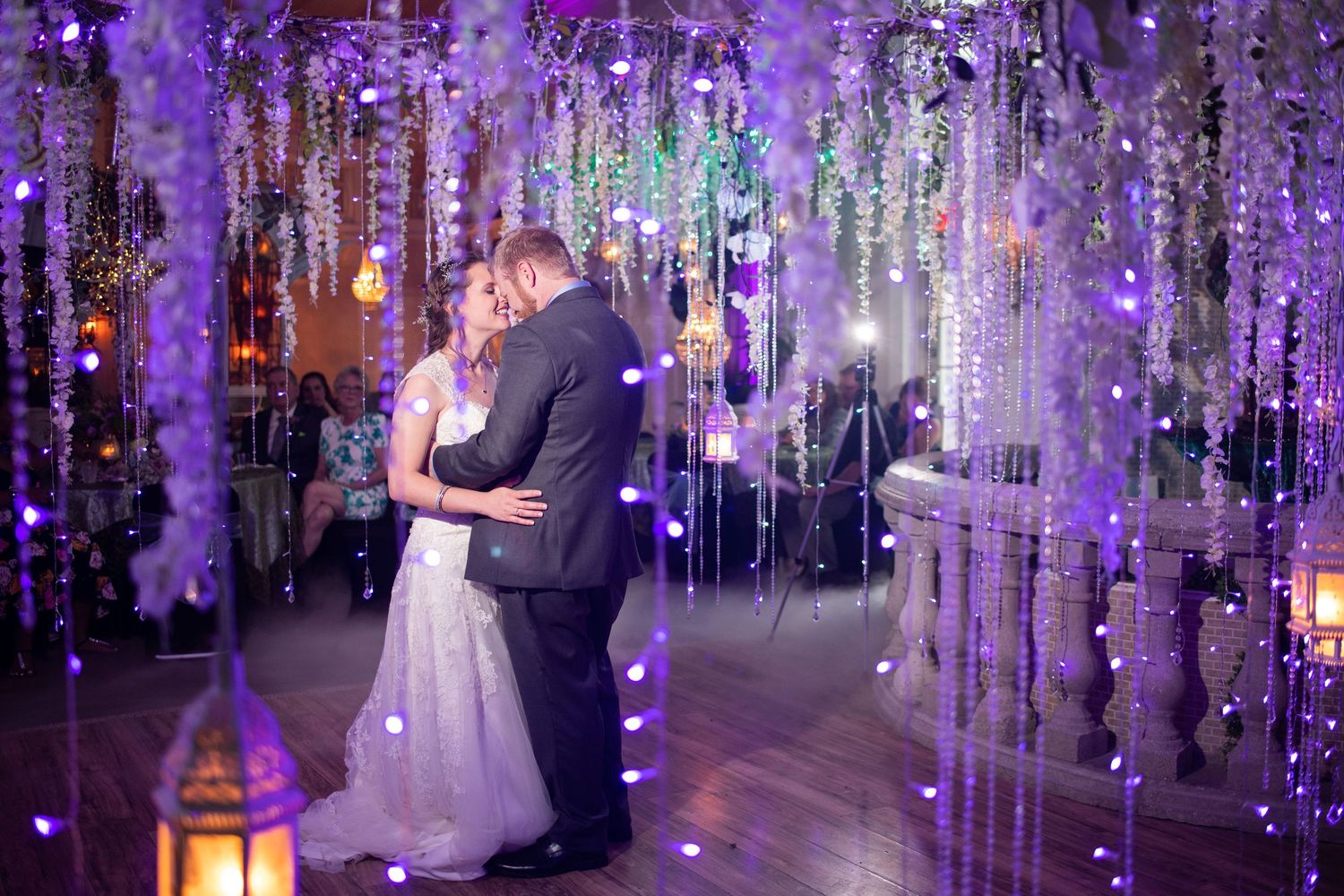 a bride and groom during first dance at a secret garden wedding venue in Independence Missouri