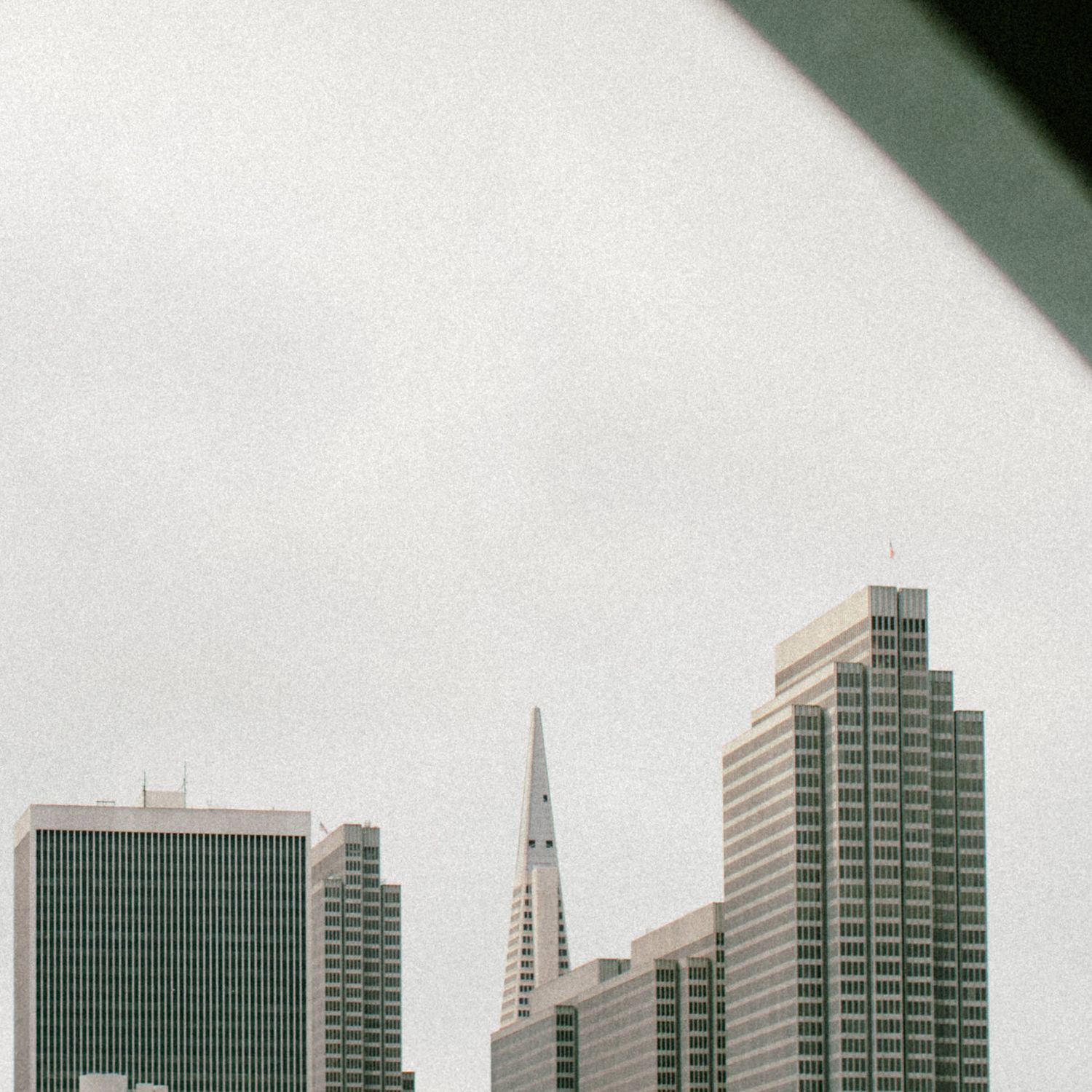 Minimalist architectural shot of San Francisco skyscrapers including TransAmerica Pyramid.