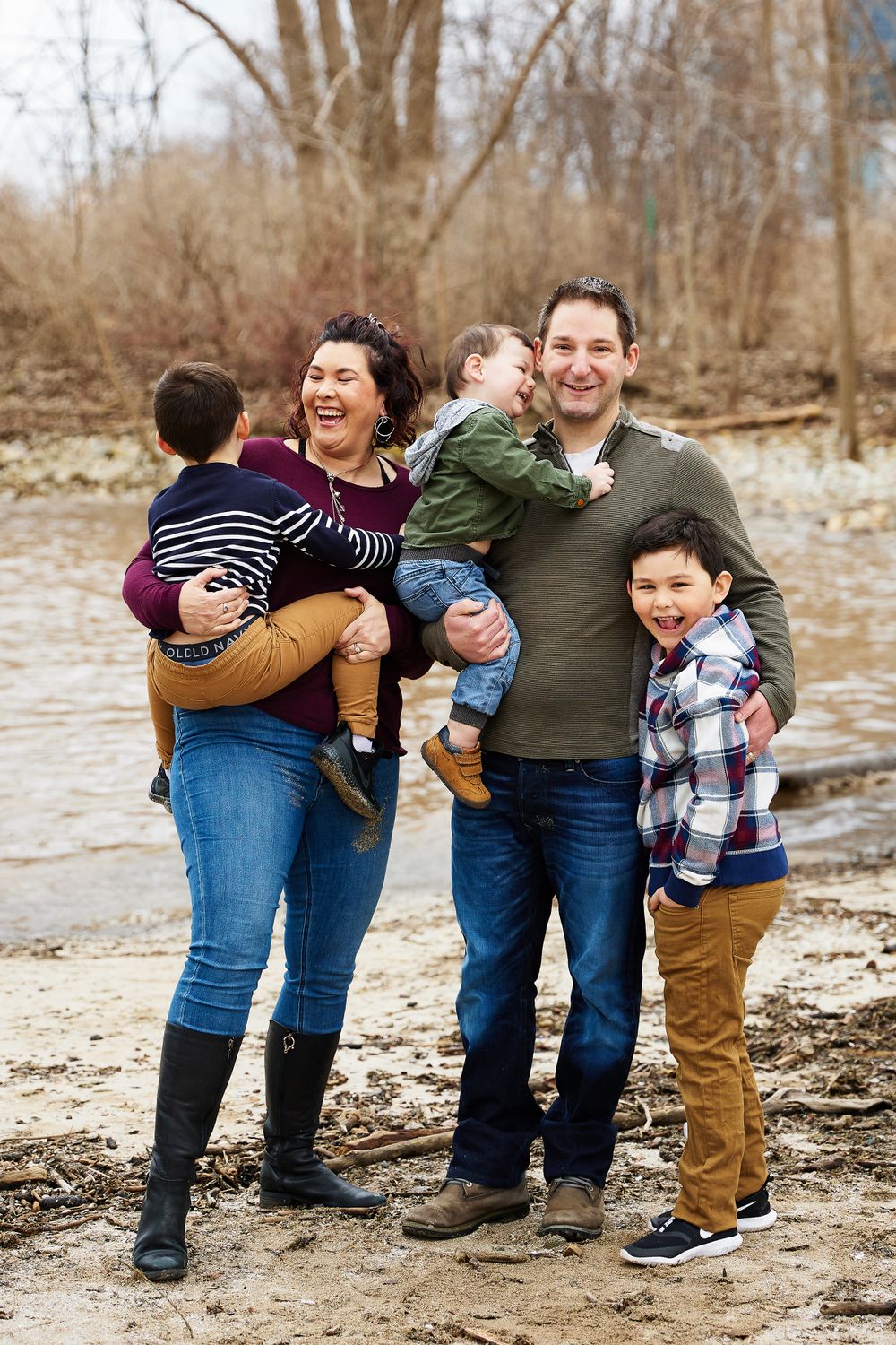 Fall family photo session outdoors at a beautiful Burlington park on the Lake laughing together