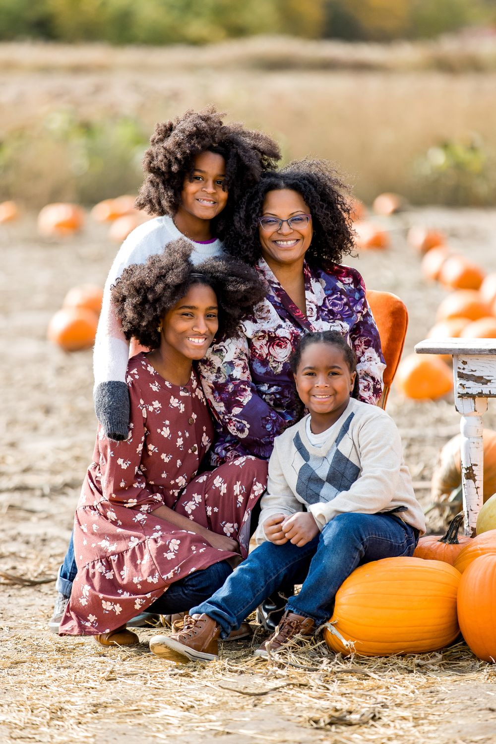 Mom and kids enjoying Fall at the Farm