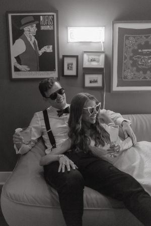 Playful black and white photo sequence showing a couple relaxing on a couch.