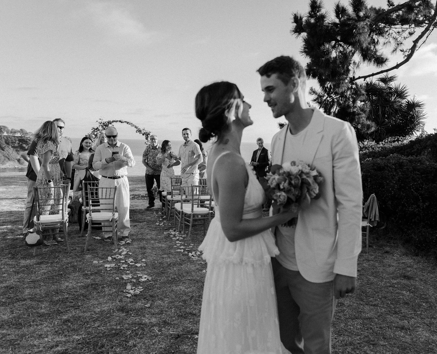 Bride and groom in Palos Verdes cliffs wedding overlooking the ocean