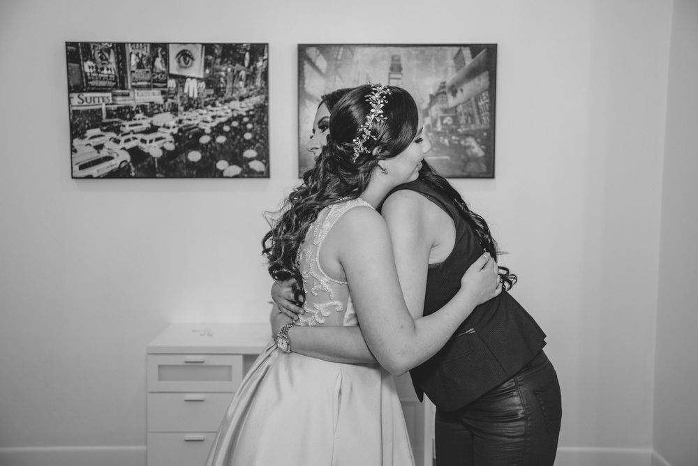 mother and daughter hugging. xv day photography
