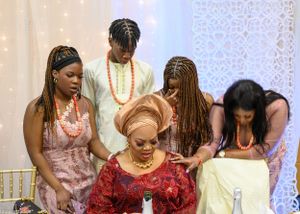 Celebrants gather around the birthday celebrant during a special moment at the party.