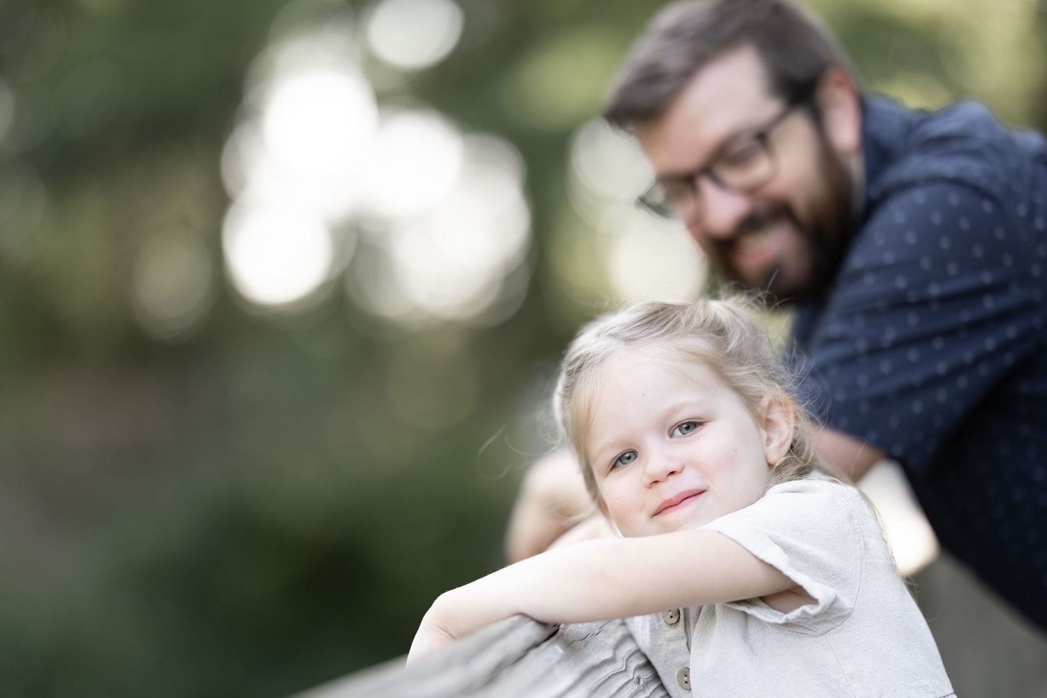 a photograph of father and daughter at Cameron Park Zoo, photographed by Blessie MJ Photo, best Waco photographer