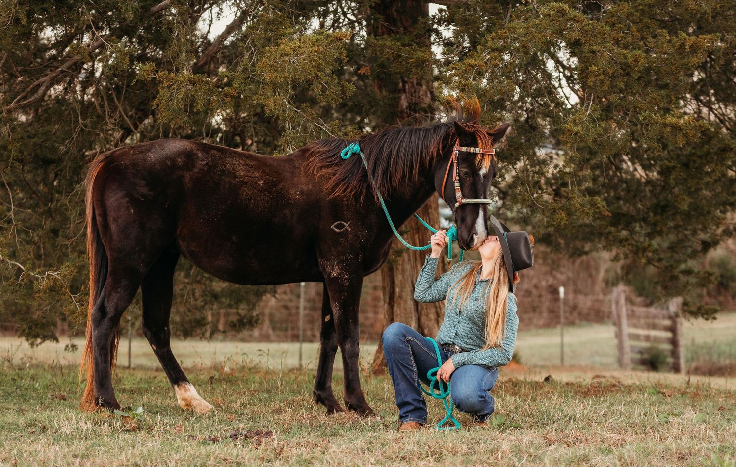 A lady sitting with her horse. Greenville sc newborn photographer, Easley sc newborn photographer, Upstate sc newborn photographer